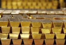 El oro supera la barrera histórica de los 5.000 dólares